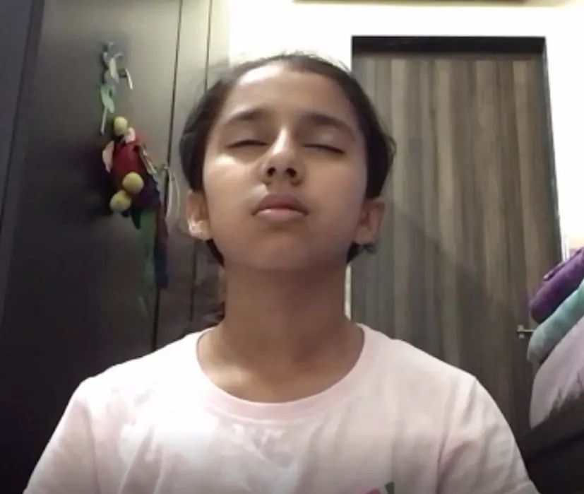 Child practicing stillness